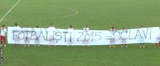 Romanian second division team Metalul Resita displayed a banner in protest at the treatment of players