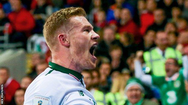 James McClean celebrates scoring against Wales in Cardiff