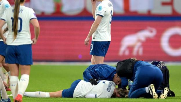 Alex Greenwood down receiving treatment