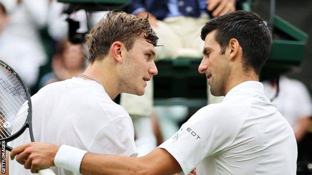Jack Draper and Novak Djokovic after the match at Wimbledon 2021