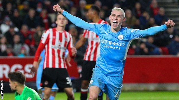 Manchester City's Phil Foden celebrates scoring against Brentford