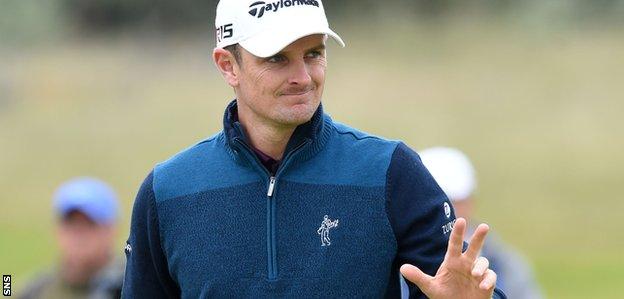 Justin Rose looks content with his scoring at Gullane