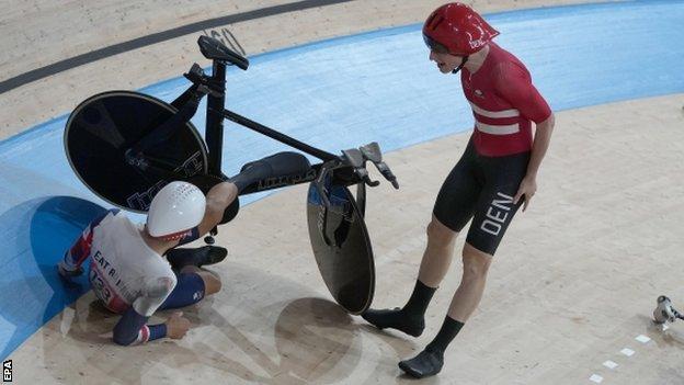 Danish rider Frederik Madsen shouts at Charlie Tanfield after crashing into the GB rider
