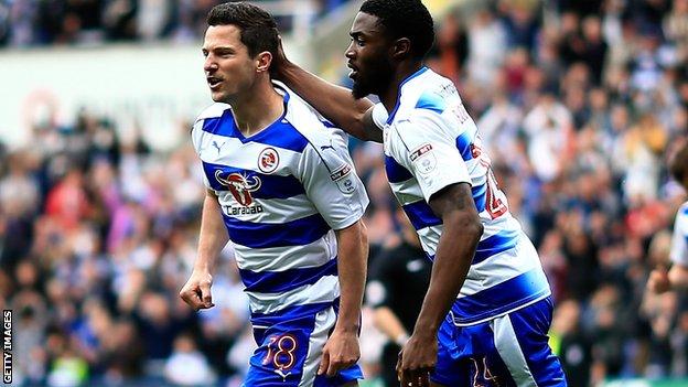 Yann Kermorgant celebrates his goal for Reading against Wigan