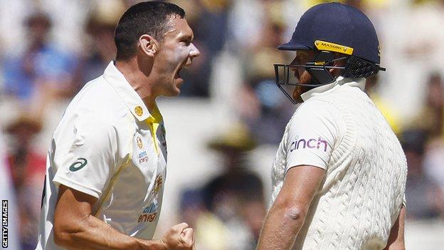 Scott Boland celebrates dismissing Jonny Bairstow