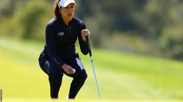 Georgia Hall lining up a putt at the LA Open