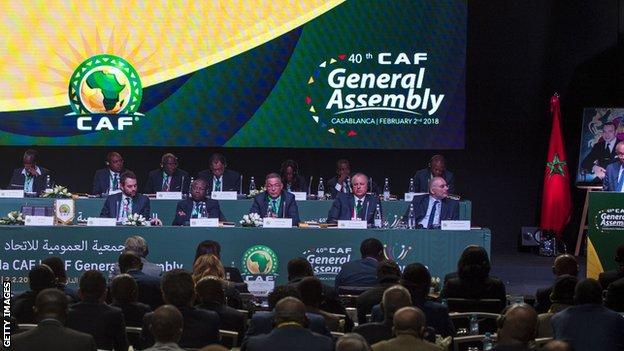 Executive Committee members listen to a speech by Caf president Ahmad
