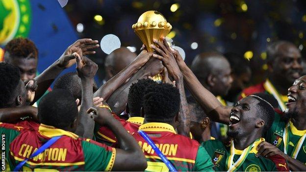 Cameroon players with the Nations Cup trophy after winning the 2017 final