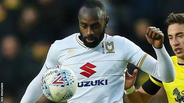 Hiram Boateng: Cambridge United sign MK Dons midfielder on loan - BBC Sport