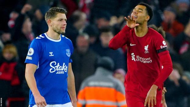 Liverpool's Cody Gakpo (right) celebrates scoring against Everton in the Merseyside derby at Anfield