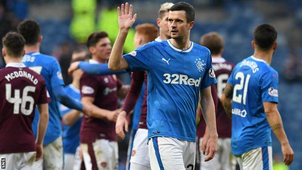 Jamie Murphy waves to supporters following Rangers' win over Hearts