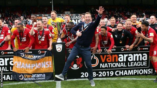 Justin Edinburgh celebrates promotion with Leyton Orient