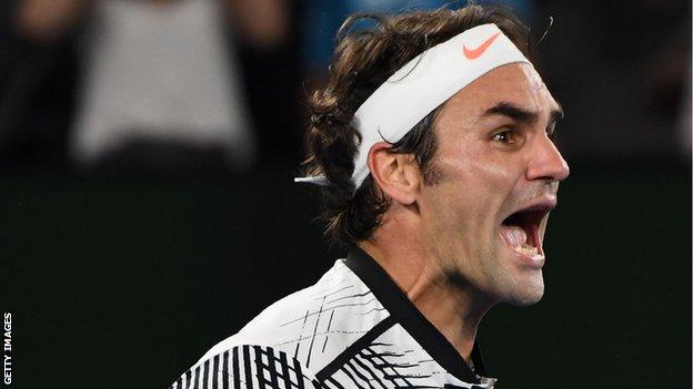 Roger Federer celebrates winning the Australian Open