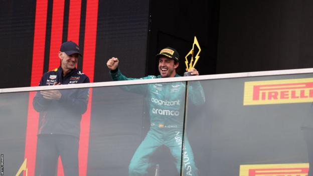 Fernando Alonso celebrates finishing second in Canada