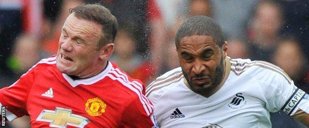 Ashley Williams (right) and Wayne Rooney