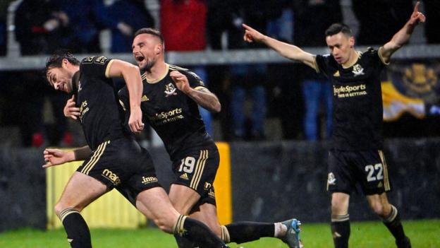 Phillip Lowry celebrates his goal
