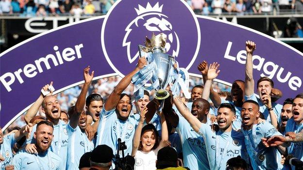 Manchester City celebrate winning the Premier League
