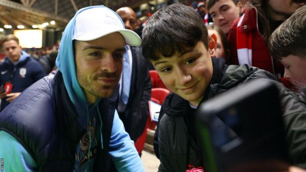 Jack Grealish poses for a selfie with a Bristol City instrumentality   earlier  Manchester City's 3-0 triumph   successful  the FA Cup 5th  circular  successful  February