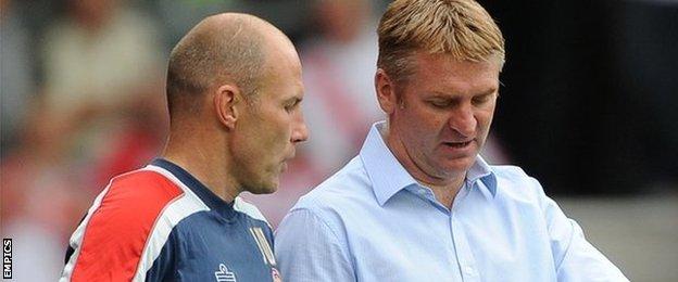 Club physio Jon Whitney assisted previous Saddlers boss prior to his departure to Brentford in November