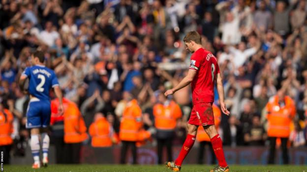 Steven Gerrard looks dejected after Chelsea score following his slip