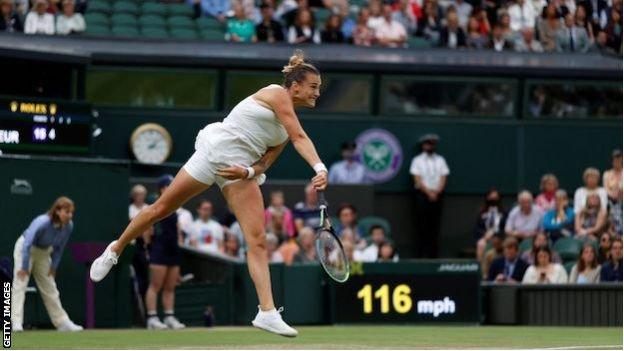 Aryna Sabalenka serves