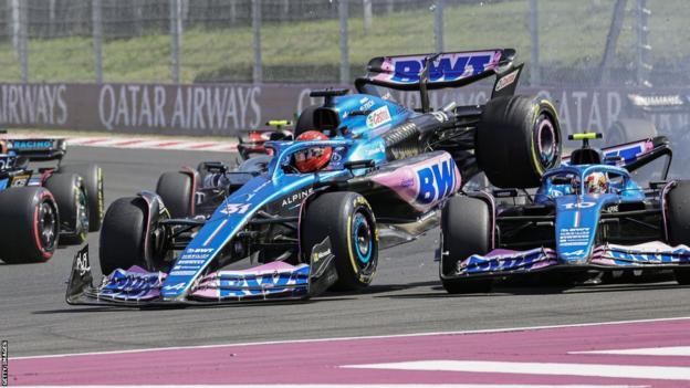 Alpines of Esteban Ocon and Pierre Gasly collide at first corner