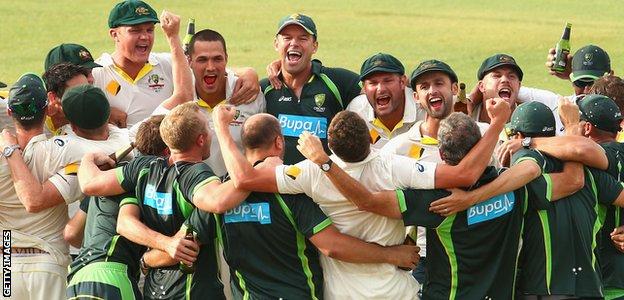 Nathan Lyon leads the team song after an Australia win in 2013