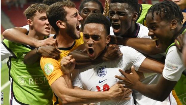 England's players celebrate winning the European Under-19 Championship