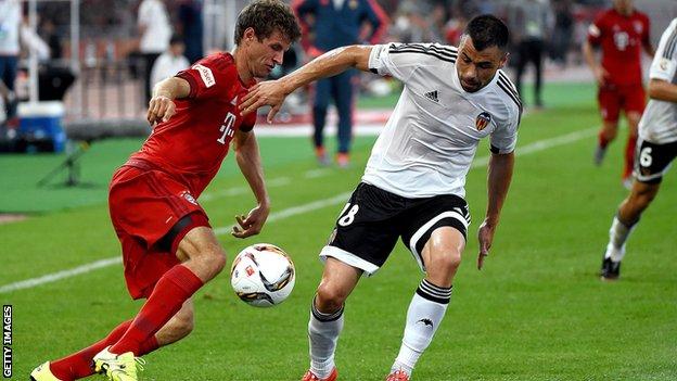 Bayern Munich striker Thomas Muller playing in a friendly against Inter Milan in China