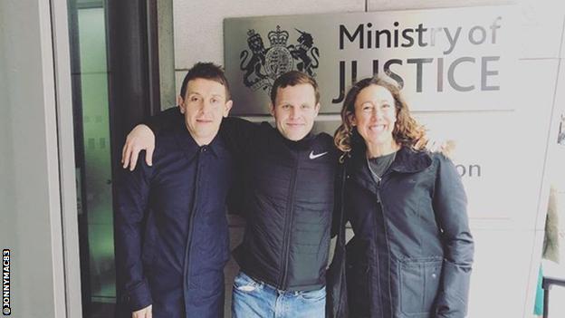 John McAvoy, pictured with Parkrun ambassador Andrew Graham and four-time world Ironman champion Chrissie Wellington outside the Ministry of Justice