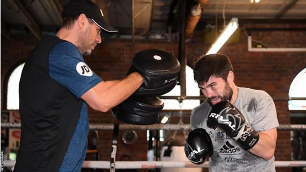 John Ryder hits the pads with trainer Tony Sims