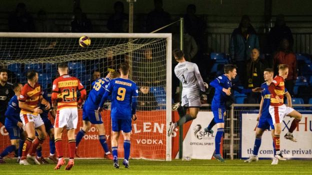 Jamie Sneddon heads home a late equaliser