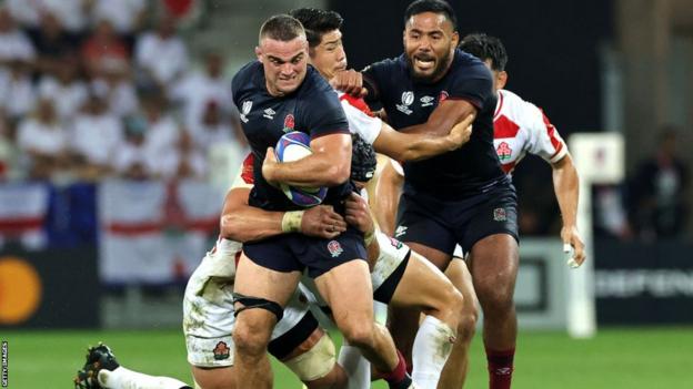 Ben Earl carries the ball for England against Japan