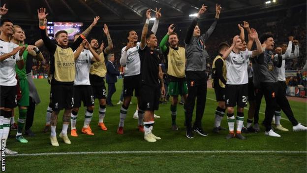 Liverpool's players celebrate reaching the Champions League final