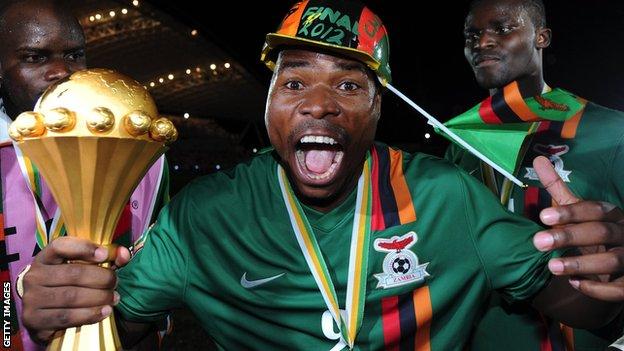 Zambia's Collins Mbesuma celebrates their unlikely Nations Cup triumph in 2012