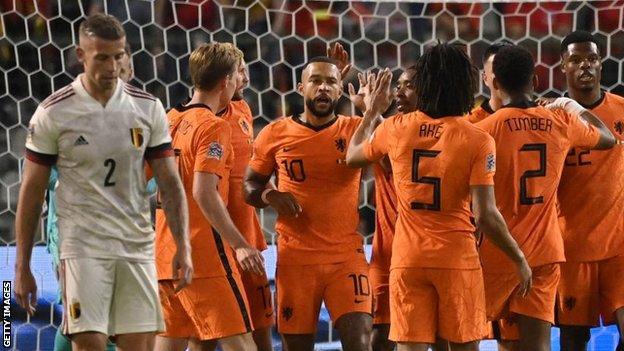 Netherlands players celebrate a goal from Memphis Depay (centre) in Belgium
