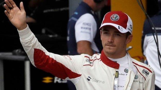 Sauber driver Charles Leclerc waves to spectators at the Italian Grand Prix