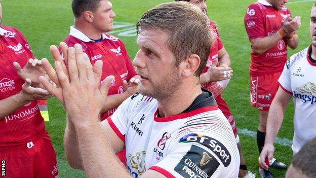 Chris Henry applauds the Ulster supporters after what turned out to be his final appearance against the Scarlets on 1 September