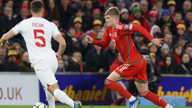 Jordan James makes another tackle against Turkey in Cardiff, in his second full 90 minutes for Wales inside four days