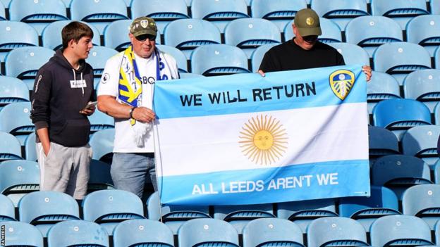 Leeds United fans react after their team is relegated from the Premier League