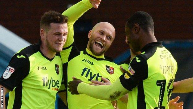 Nicky Law celebrates scoring against Carlisle