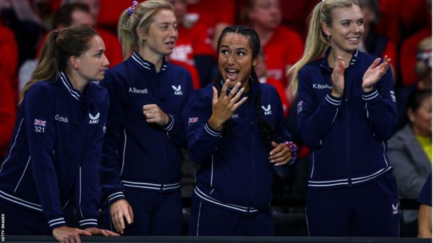 Great Britain's Billie Jean King Cup players cheer on their team against France