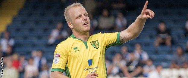 Steven Naismith celebrates scoring for Norwich City