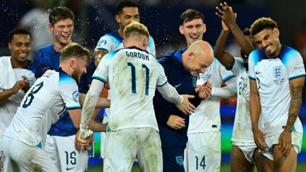 England Under-21s manager   Lee Carsley celebrates with players