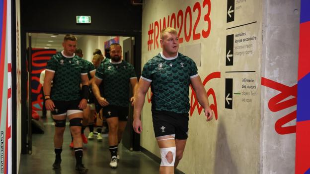 Dewi Lake leads out Wales at their