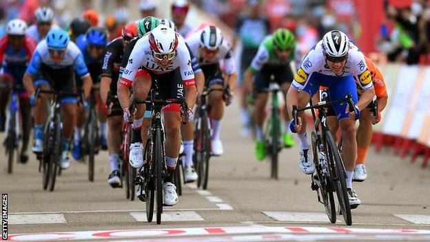 Sam Bennett overhauls Jasper Philipsen to win stage four of the Vuelta a Espana