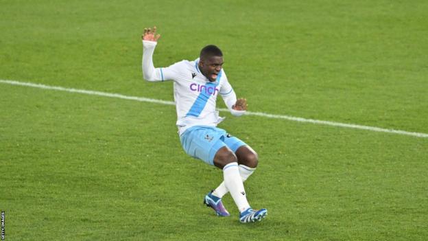 Cheick Doucoure grimaces after injuring his Achilles during Crystal Palace's 2-1 defeat by Luton Town on Saturday.