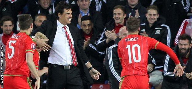 Scorer Aaron Ramsey rushed to celebrate with his Wales team-mates