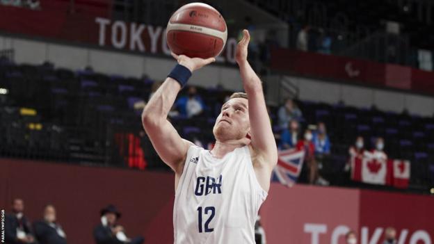 Great Britain's Gregg Warburton shoots the ball at the Tokyo Paralympics