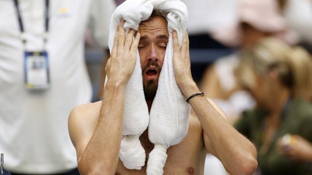 Medvedev with an ice towel
